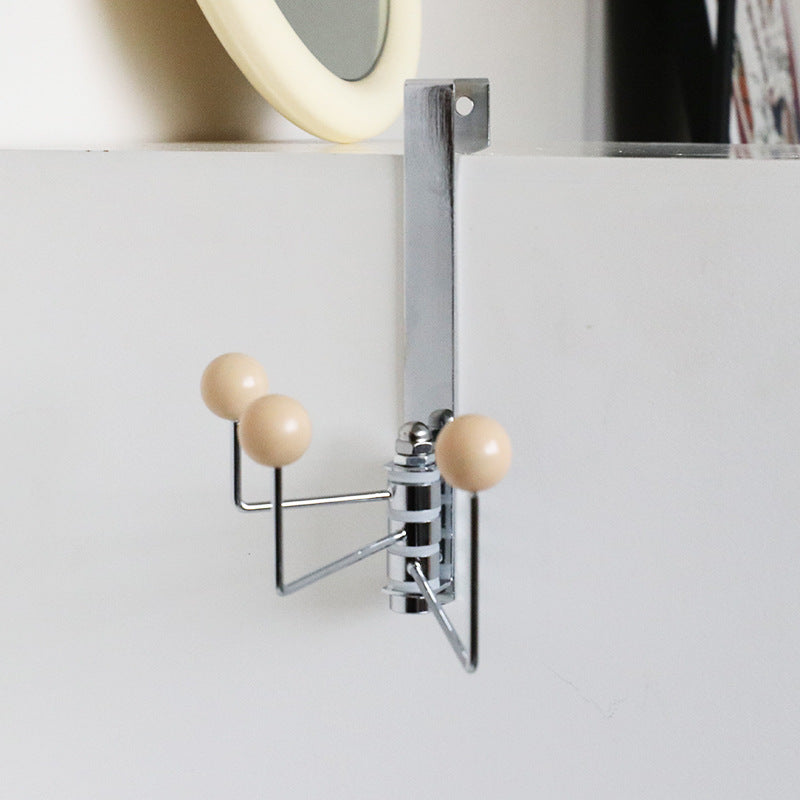 Eleganter Wandhaken aus Metall mit Punkt-Details; moderner Türhaken für Jacken, Taschen & Handtücher, platzsparend.