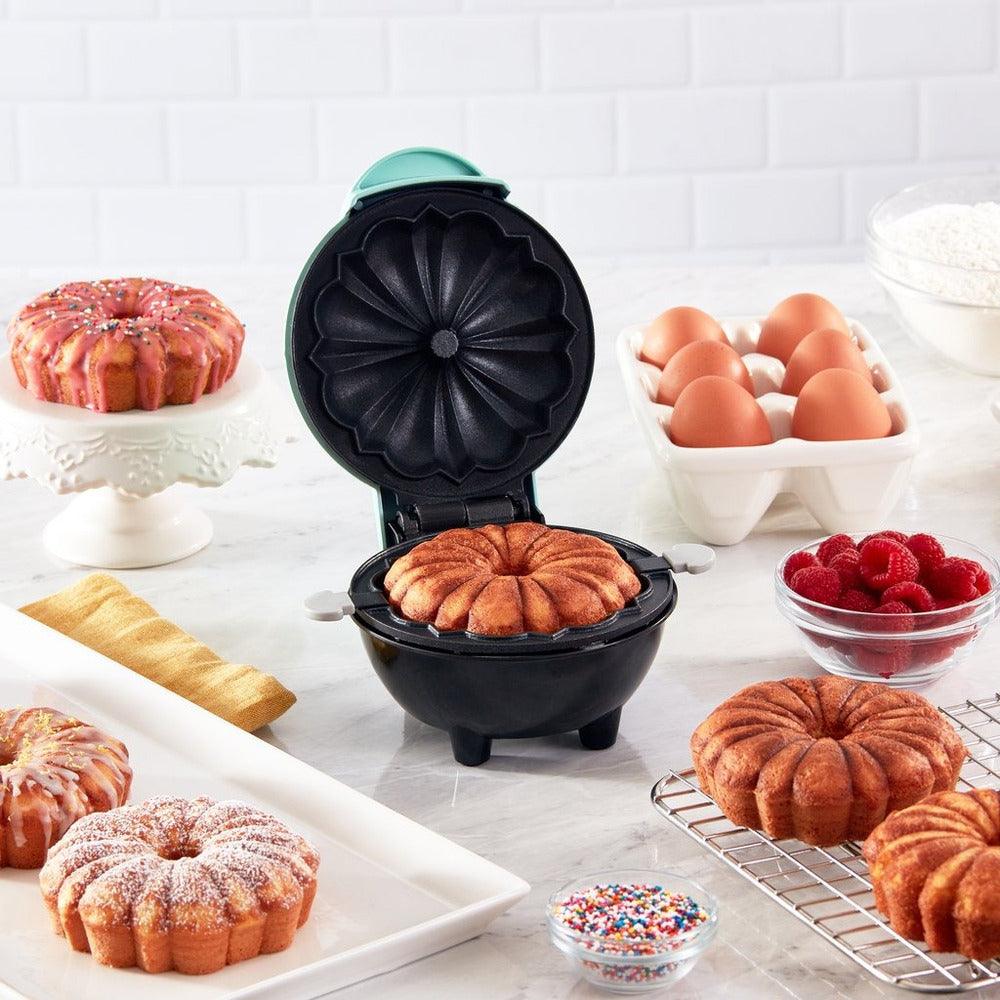 Elektrisches Kuchenbackgerät für müheloses Backen perfekter Kuchen zu Hause; ein kompaktes Küchengerät.
