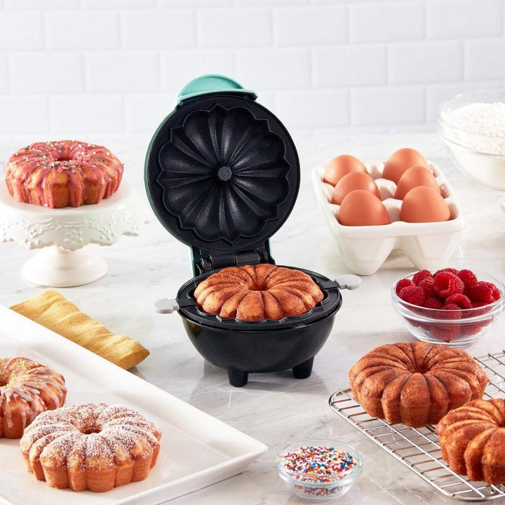 Elektrisches Kuchenbackgerät für müheloses Backen perfekter Kuchen zu Hause; ein kompaktes Küchengerät.