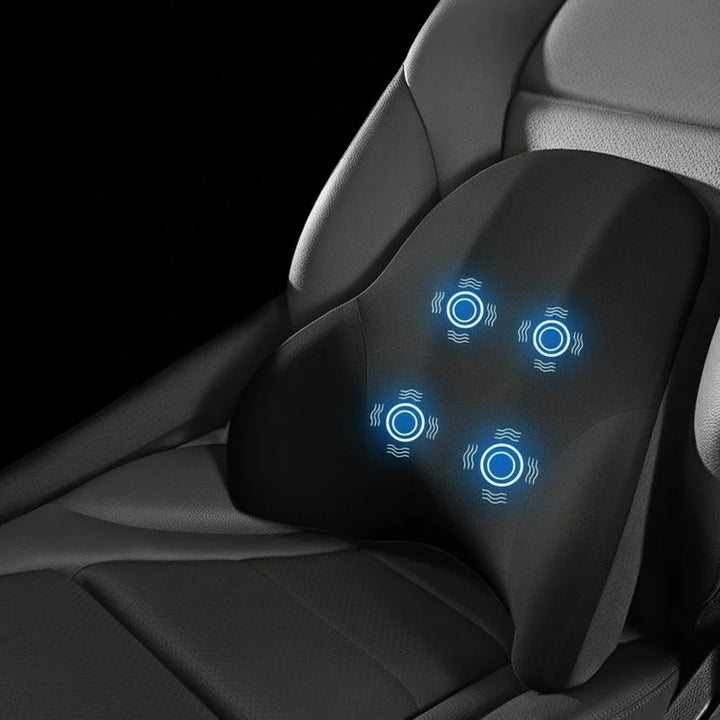 Nahaufnahme: Elektrisches Nackenkissen im Autositz, bietet Komfort und Vibrationsmassage beim Fahren.