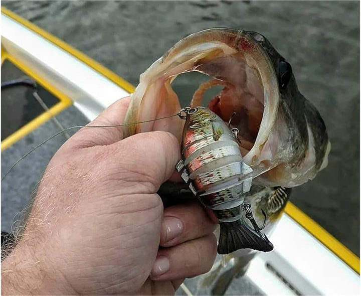 Detailaufnahme des AI Raubfischköders mit Haken & USB-Ladeanschluss. Innovativer elektronischer Fischköder.