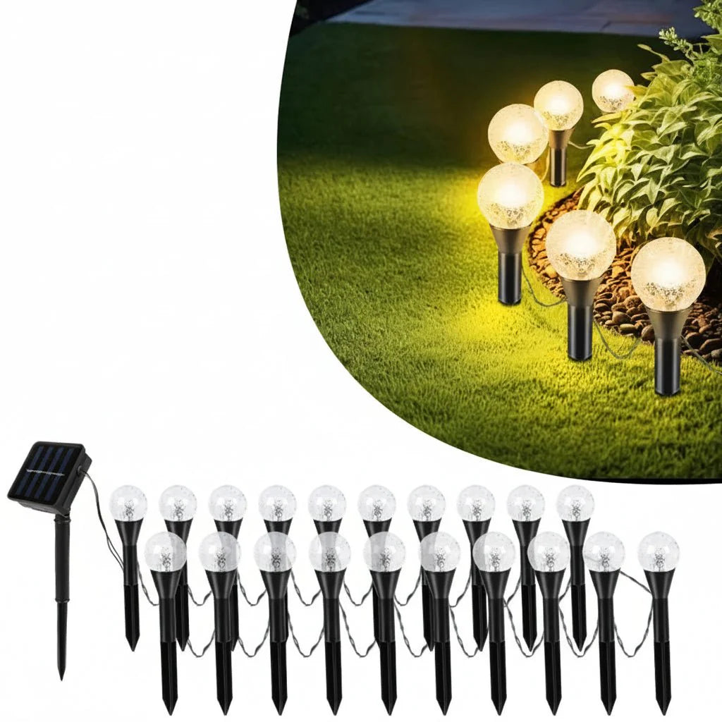 Solar-Lichterkette taucht den Garten in warmes LED-Licht, perfekt für stimmungsvolle Abende im Freien, energieeffizient.