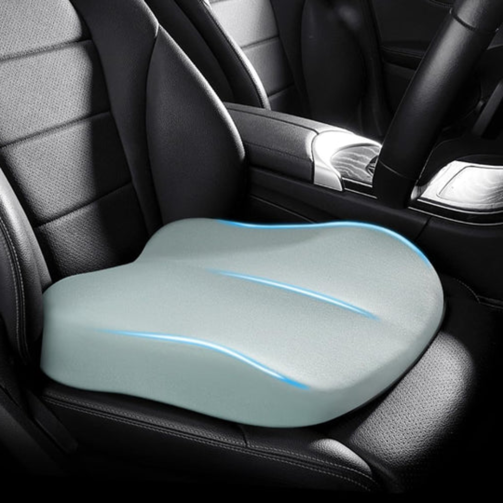 Ergonomisches Memory Foam Sitzkissen zur Haltungskorrektur im Auto oder am Schreibtisch, entlastet den unteren Rücken.