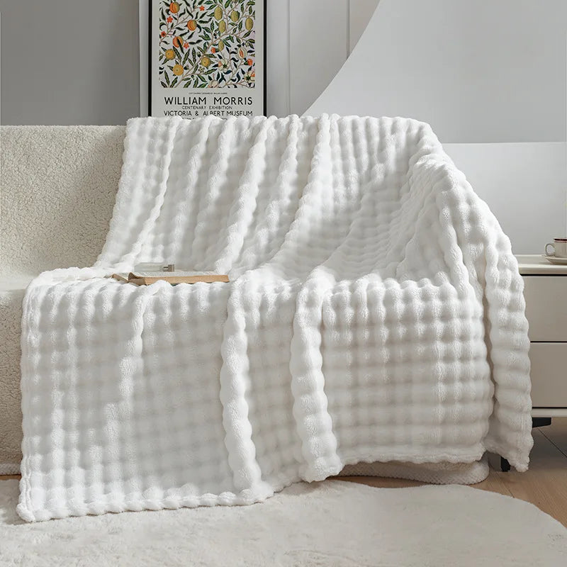 Gemütliche Wohndecke für Wohnzimmer, weich und warm, mit stilvoller Blasenstruktur, perfekt als Dekoration.