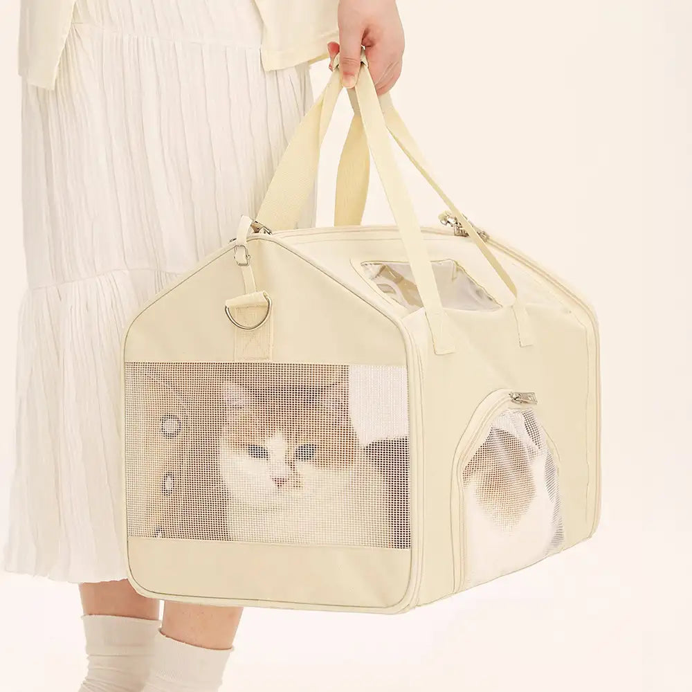 Faltbare, atmungsaktive Haustiertragetasche für sicheren Transport von Katze oder kleinem Hund; ideal für Reisen.