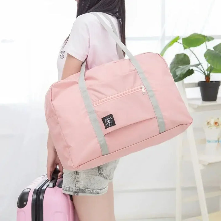 Faltbare Reisetasche, leicht & wasserdicht, ideal als Handgepäck für Damen & Herren auf Reisen.