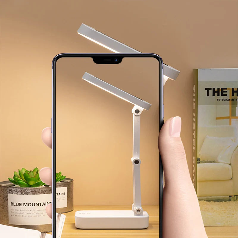 Augenschonende LED Tischlampe, solar- & USB-aufladbar, dimmbar, faltbar für flexibles Lesen & Arbeiten.