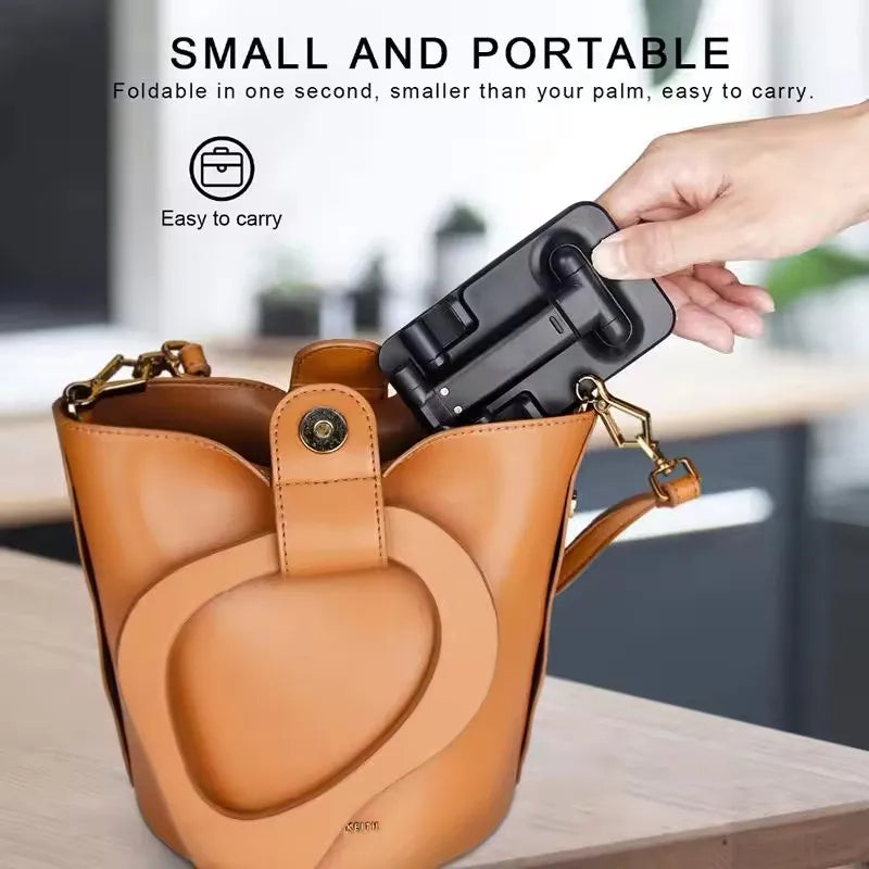 Faltbarer FlexStand Handyhalter für den Schreibtisch. Ergonomischer Tablet-Ständer für freihändiges Arbeiten im Büro.