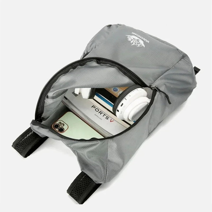 Ultraleichter Wanderrucksack 20L in faltbarem Design, wasserdicht und platzsparend für jeden Trip.