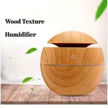 Flüsterleiser USB Luftbefeuchter mit LED Licht & Aromatherapie, ideal für besseres Raumklima & Wellness.