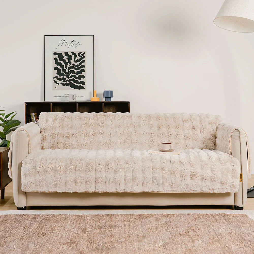 Gemütlicher Sofaschonbezug, wasserabweisend und flauschig, für mehr Lebensqualität.