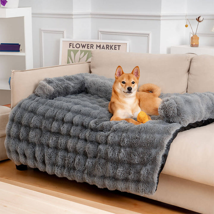 Gemütliches Kuschelbett für Hunde, flauschig und beruhigend, mit integriertem Sofaschutz.