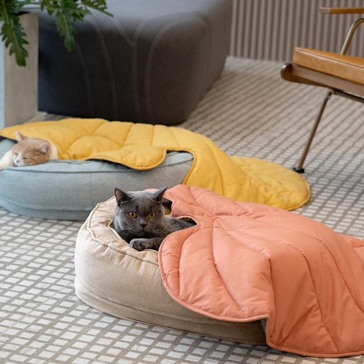 Ergonomisches Flausch-Hundebett in Donutform, lindert Gelenkschmerzen beim Hund.