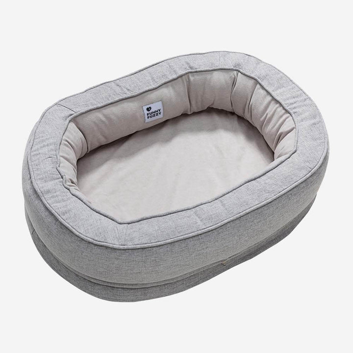 Komfortables orthopädisches Hundebett Donut, flauschiges Design für Haustiere.