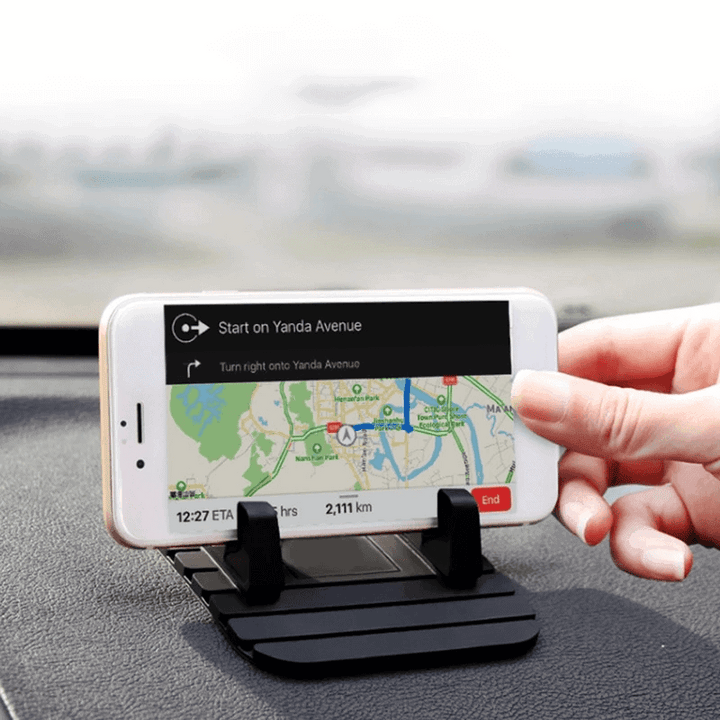 Tragbarer Silikon-Handyhalter in Rot, biegsam und rutschfest, ideal als Smartphone-Ständer für unterwegs und Büro.