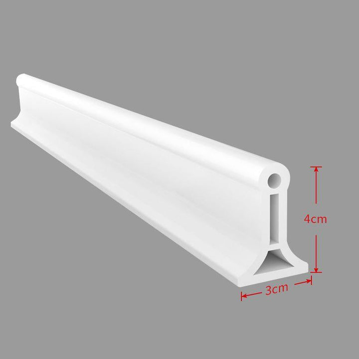 Transparenter Silikon-Wasserrückhalter, selbstklebend & flexibel, als Spritzschutz für Duschbereiche.