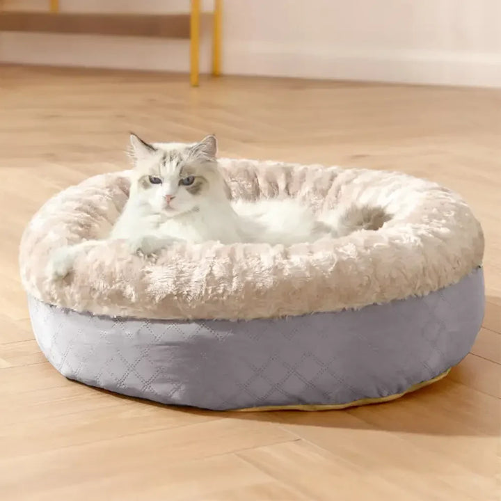 Fluffiges Donut Hundebett aus warmem Kunstpelz für maximalen Komfort. Weiches Kuschelbett für Hunde.
