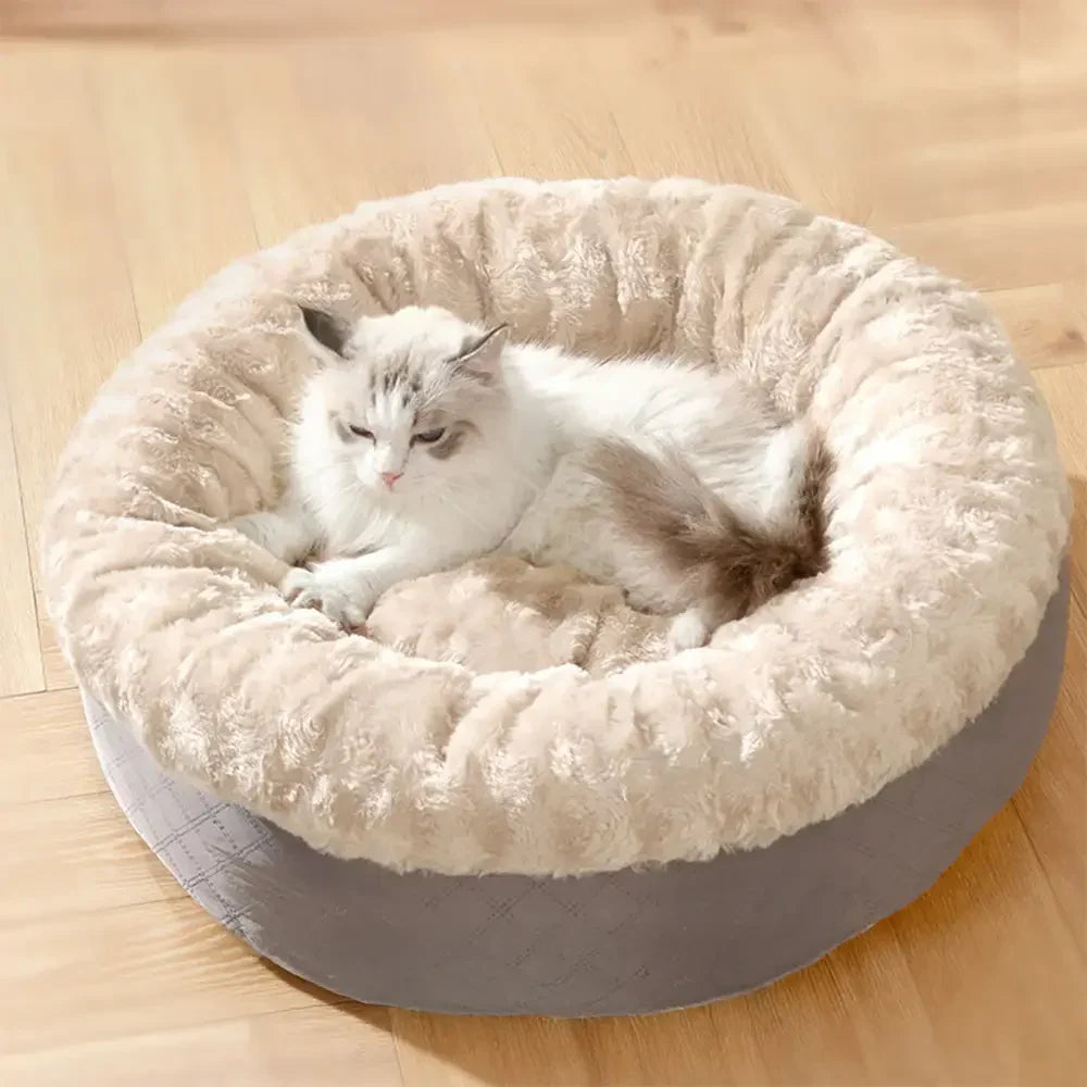 Bequemes Kunstpelz Hundebett, Donut-Form und extra warm. Perfekt als waschbares Kuschelbett für Hunde.