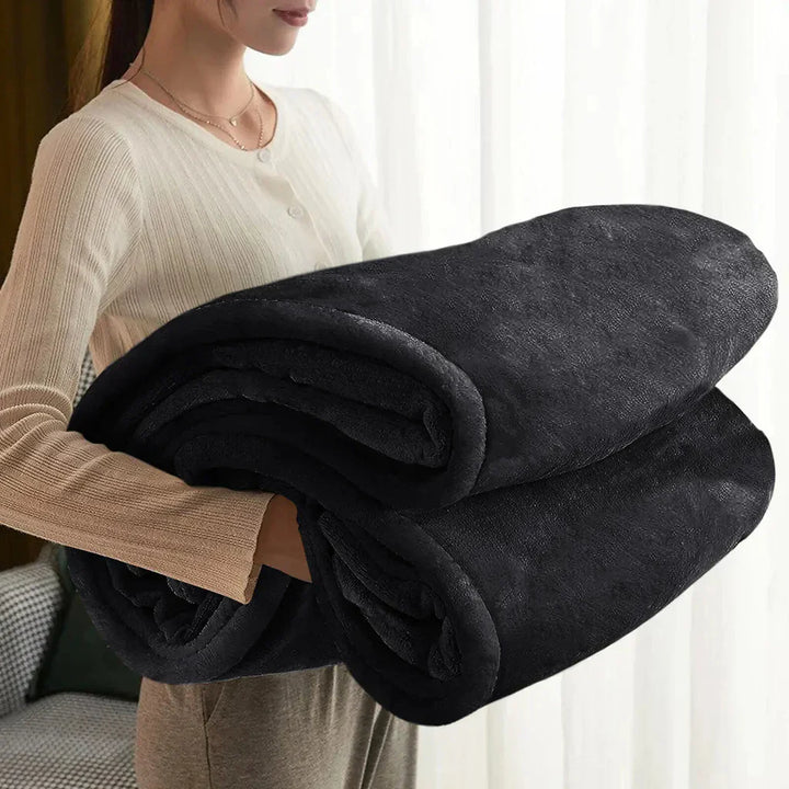 Elegante Fleece Wohndecke, vielseitig einsetzbar; weich & warm für gemütliche Stunden am Sofa.