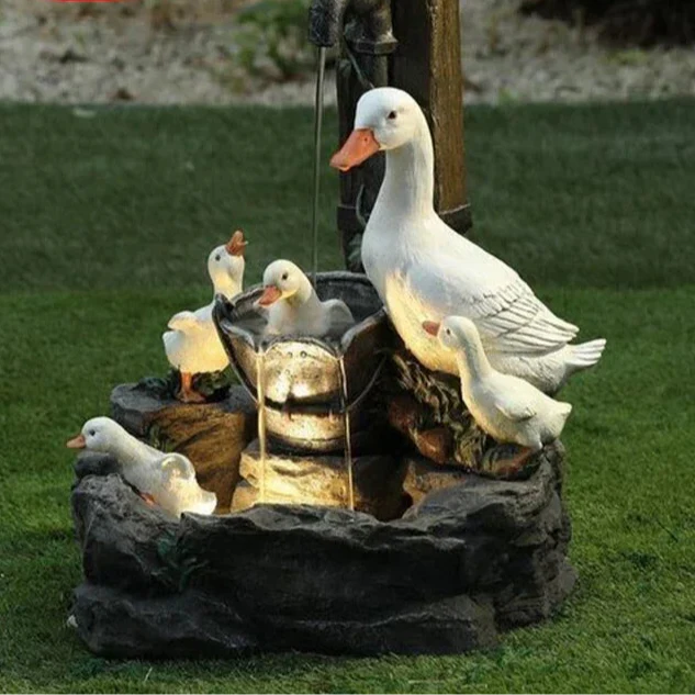 Leuchtende Garten-Deko: Ente & Eichhörnchen mit Solar-LED-Licht, ideal für schöne Abende auf der Terrasse.