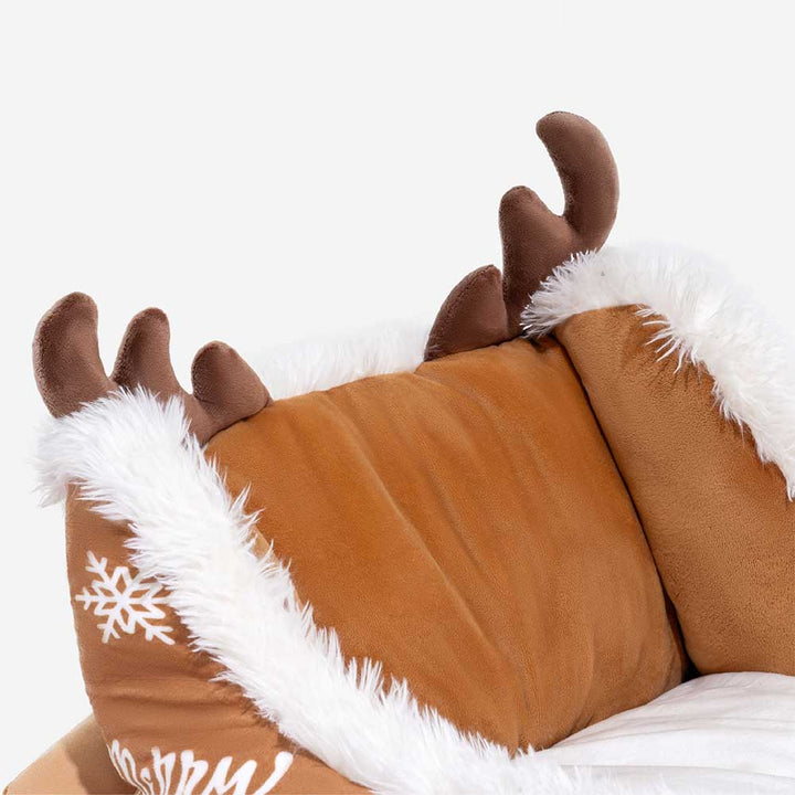 Hundebett als roter Plüsch-Weihnachtsschlitten. Komfortabler Schlafplatz für die Feiertage.
