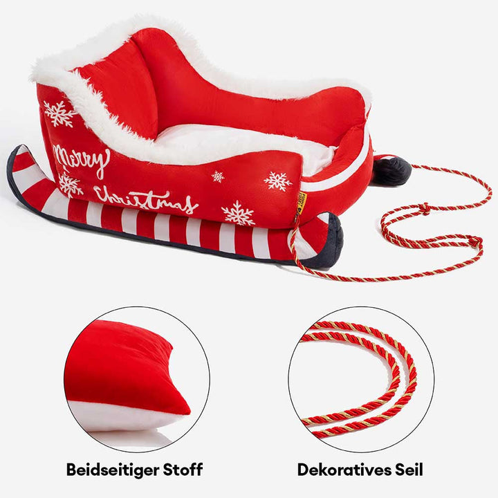 Rotes Plüsch-Hundebett in festlicher Schlittenform. Kuschelig weich für kalte Wintertage.