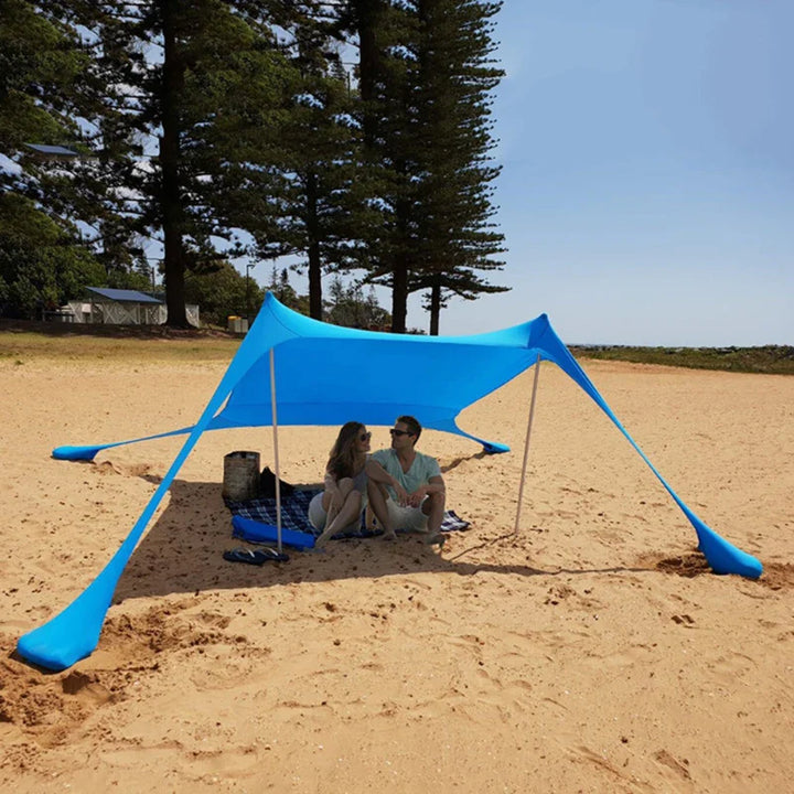 Geräumige Strandmuschel mit UPF50+ UV-Schutz, idealer Sonnenschutz für Familie am Strand im Sommer.