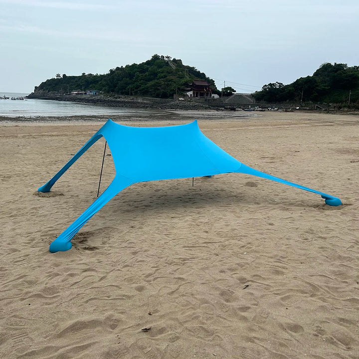 Sommerliche Lycra-Strandmuschel mit UPF50+ UV-Schutz, winddicht und wasserdicht für den Strand.