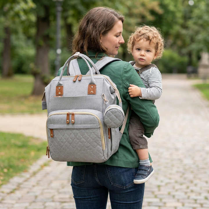 Cleveres Babyausstattung-Geschenk: 3-in-1 Wickelrucksack mit praktischem faltbaren Reisebett.