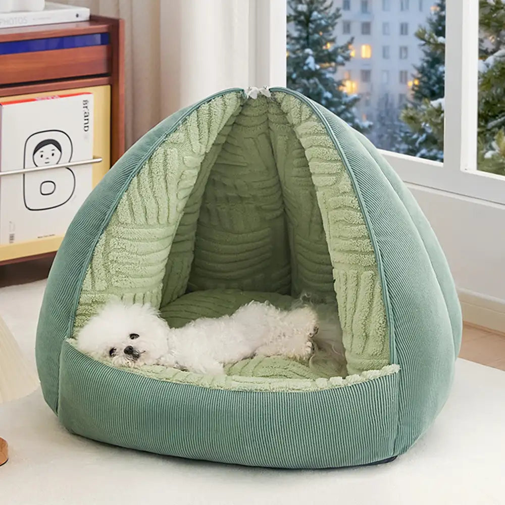 Komfortables Hundebett (blau) mit Höhlenfunktion und offener Liegefläche, ideal für Geborgenheit.