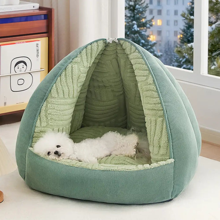 Komfortables Hundebett (blau) mit Höhlenfunktion und offener Liegefläche, ideal für Geborgenheit.