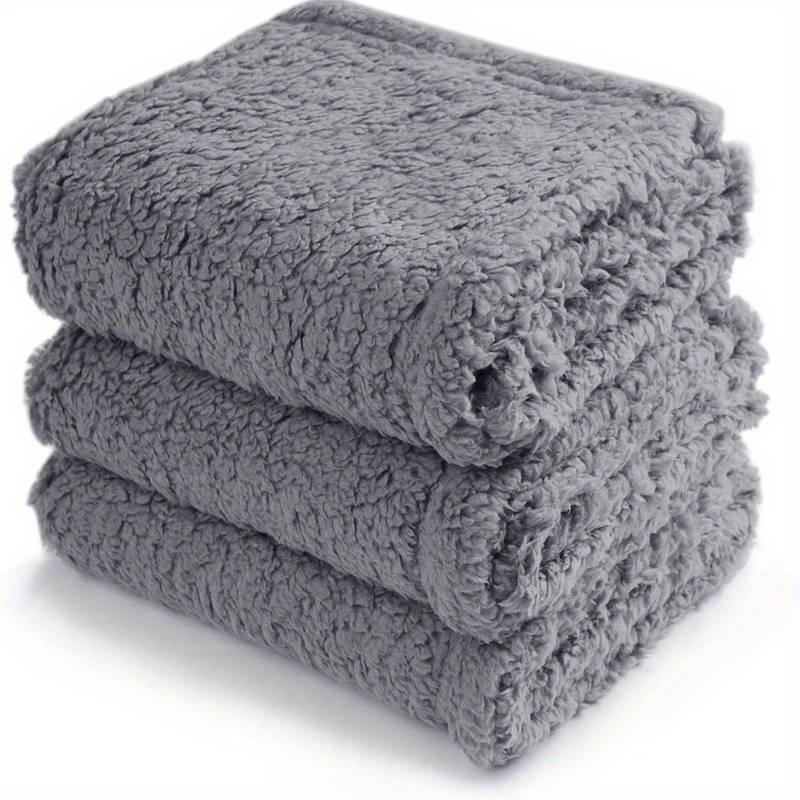 Schwarze Fleece-Haustierdecke, waschbar, für Welpen & kleine Hunde; weich und wärmend.