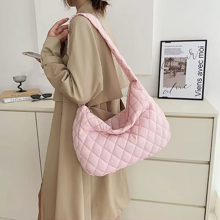 Rosa Damen Puffer Umhängetasche, groß & gesteppt, wasserdicht, perfekt für Freizeit, Sport & Reisen.