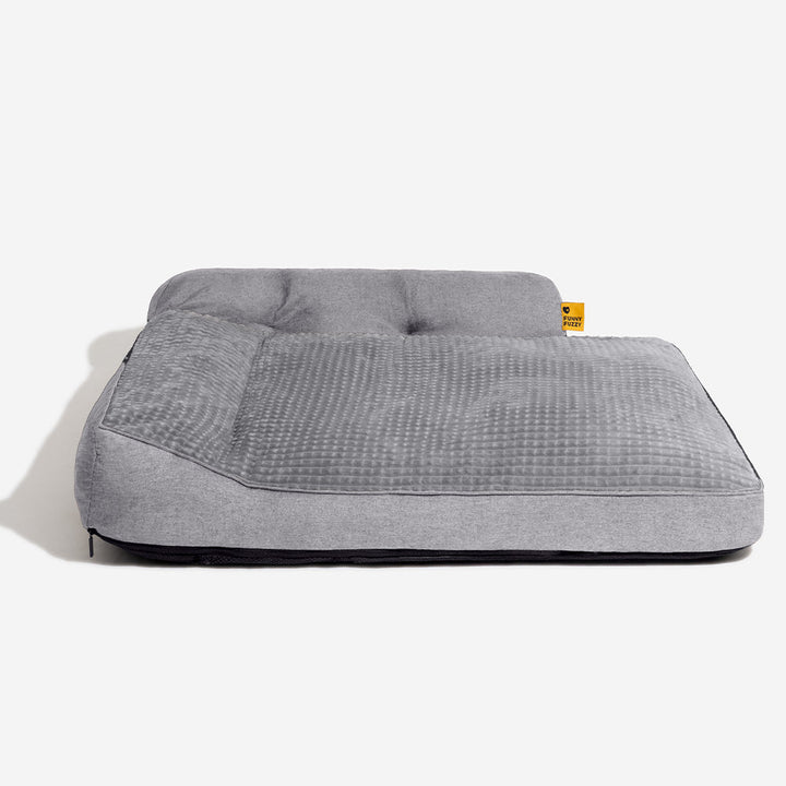 Waschbares, weiches Katzenbett im Eckformat, bietet orthopädischen Komfort.