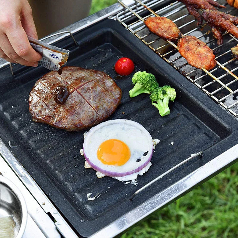 Langlebige Gusseisen-Wendegrillplatte, 25x30 cm, speichert Hitze optimal für gleichmäßiges Braten & Grillen.