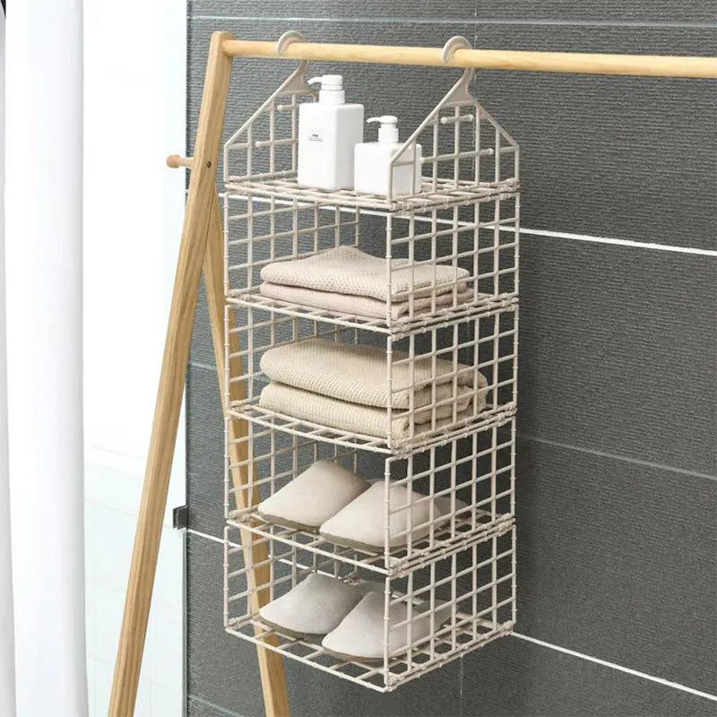 Praktischer Aufbewahrungsorganizer für Kleidung und Accessoires im Schlafzimmer.