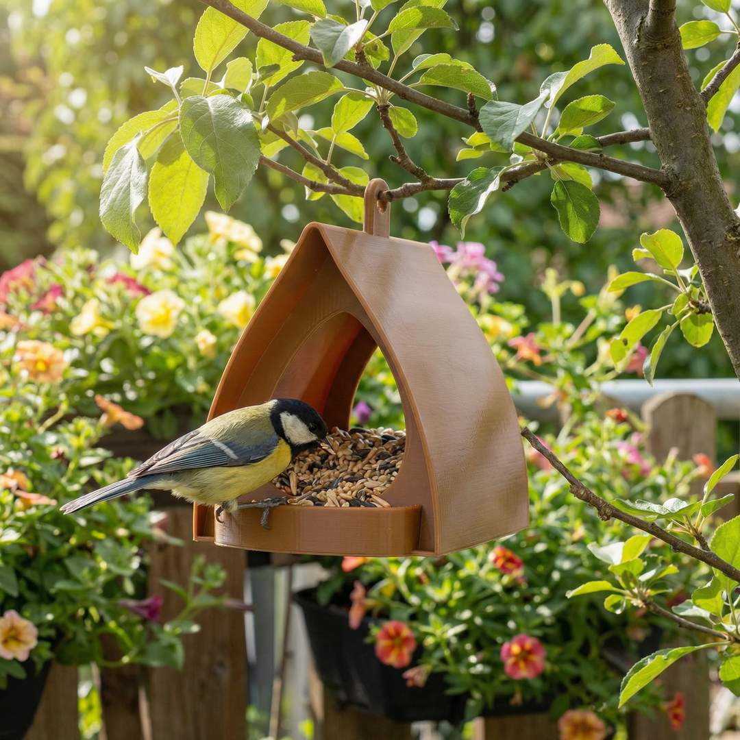 Vogelfütterung leicht gemacht: Hängendes Futterhaus für Garten & Balkon, wetterfest und dekorativ.