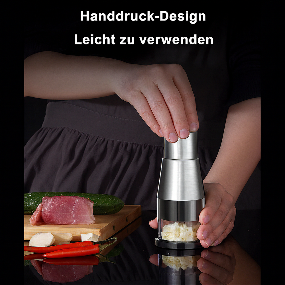 Manueller Gemüseschneider aus Edelstahl für schnelles Hacken von Zwiebeln, Knoblauch und Kräutern.