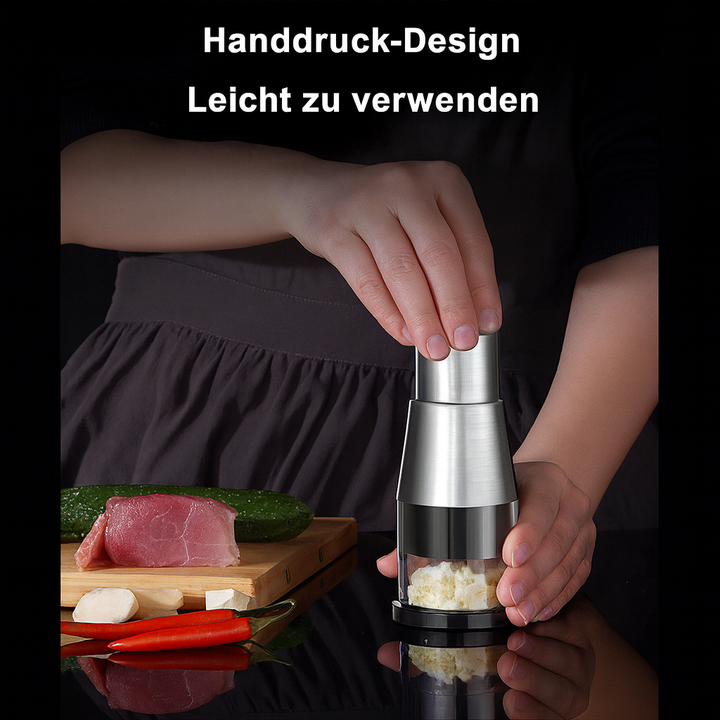 Manueller Gemüseschneider aus Edelstahl für schnelles Hacken von Zwiebeln, Knoblauch und Kräutern.