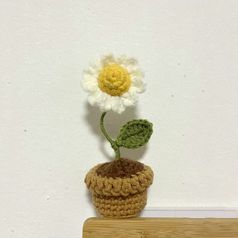Elegante florale Deko: Handgestrickte Blumen als langlebige Wohnaccessoires.