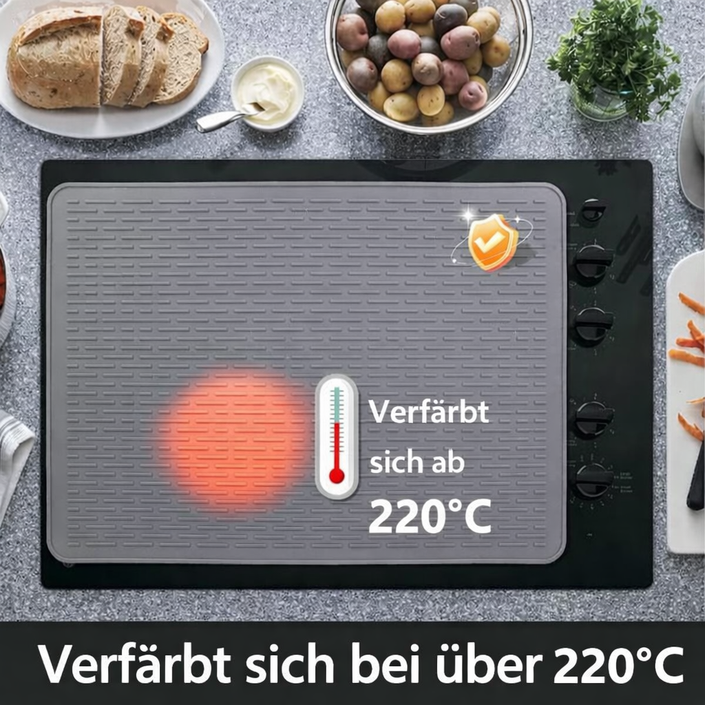 ThermaGuard Schutzmatte auf Induktionskochfeld: Verhindert Kratzer & Schmutz, ideal als Spritzschutz.