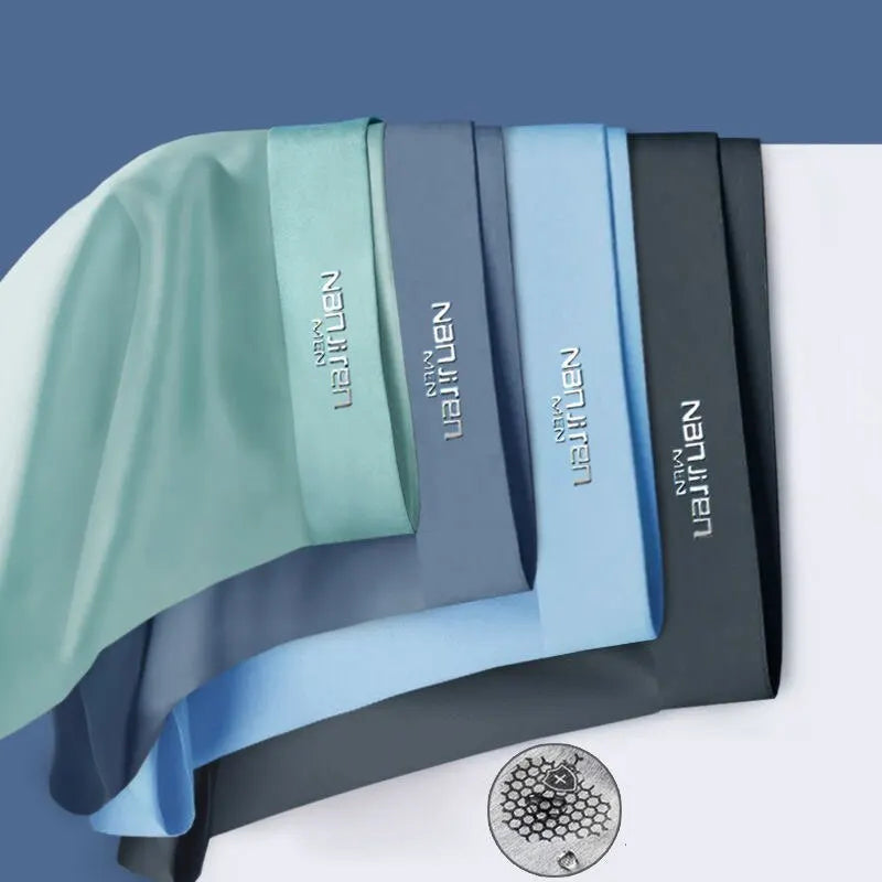 Hygienische Herren Boxershorts: Atmungsaktives 4er-Set Unterwäsche mit feuchtigkeitsableitender Kühltechnologie.