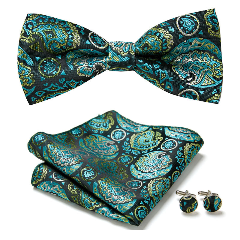 Herren Geschenk-Set: Blumen-Fliege, Einstecktuch & Manschettenknöpfe. Für den stilvollen Mann.