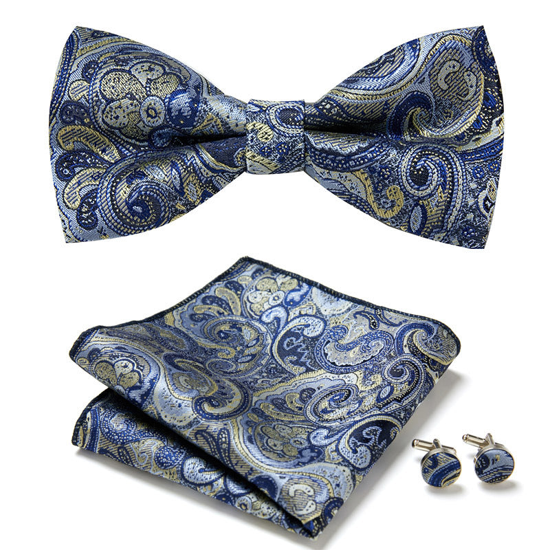 Elegantes dreiteiliges Herren-Set: Florale Fliege, Einstecktuch, Manschettenknöpfe. Vielseitig einsetzbar.