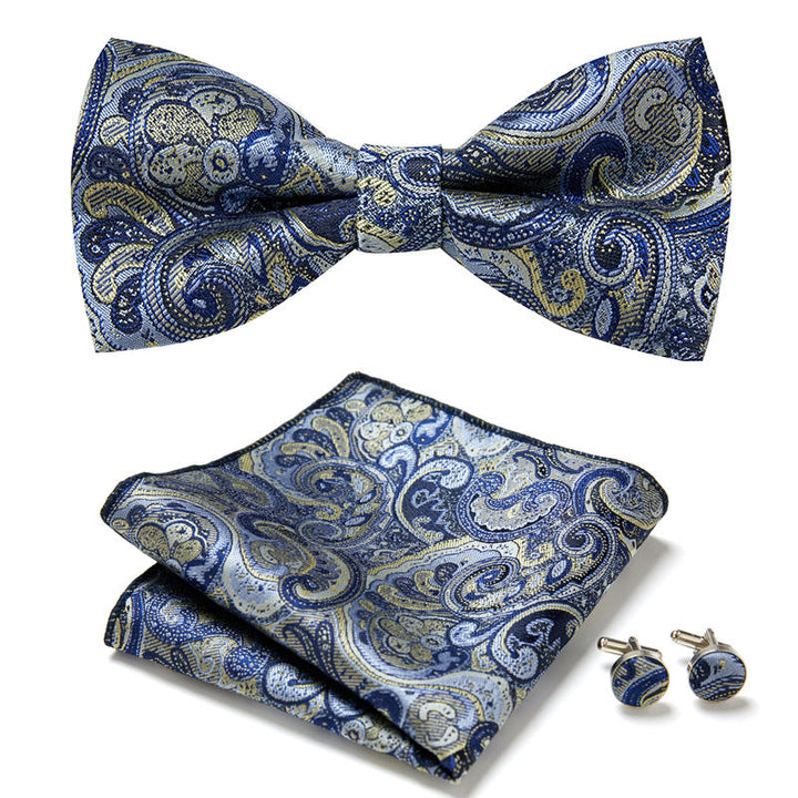 Elegantes dreiteiliges Herren-Set: Florale Fliege, Einstecktuch, Manschettenknöpfe. Vielseitig einsetzbar.