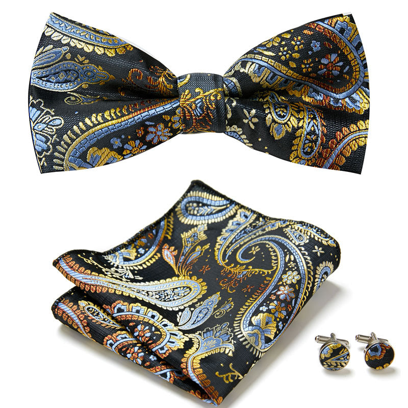 Stilvolles Herren Fliegen-Set mit Blumen-Print, inklusive Manschettenknöpfen & Einstecktuch. Sehr elegant.