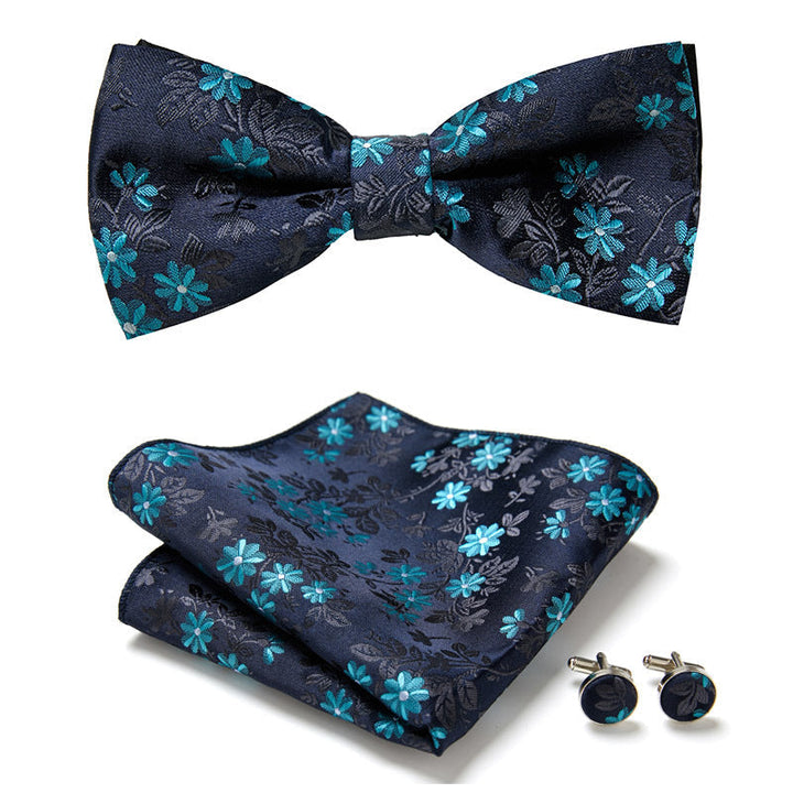 Festliches Herren Fliegen-Set aus Polyester, floral gemustert, ideal für elegante Anzüge & Partys.