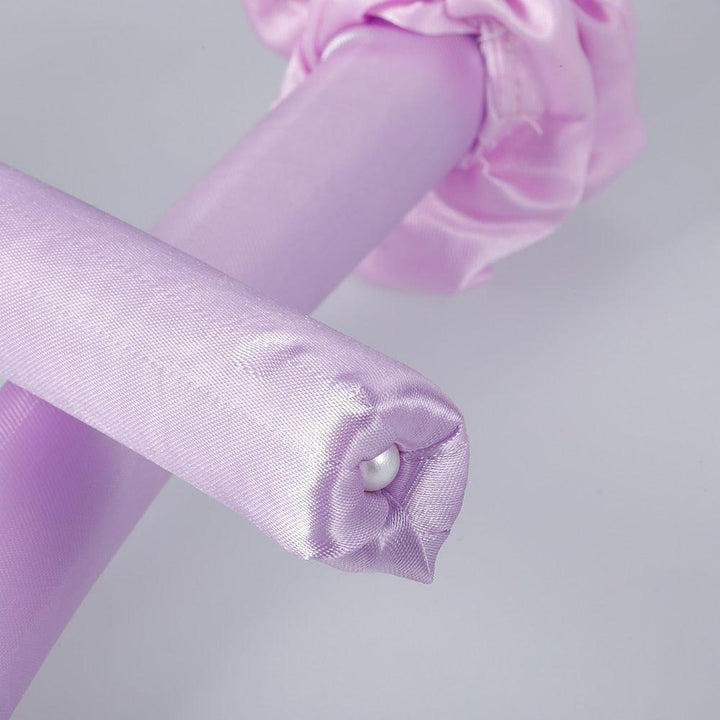 Innovativer hitzefreier Lockenstab für natürliche Wellen und Locken ohne Hitzeschäden. Perfektes Hairstyling.
