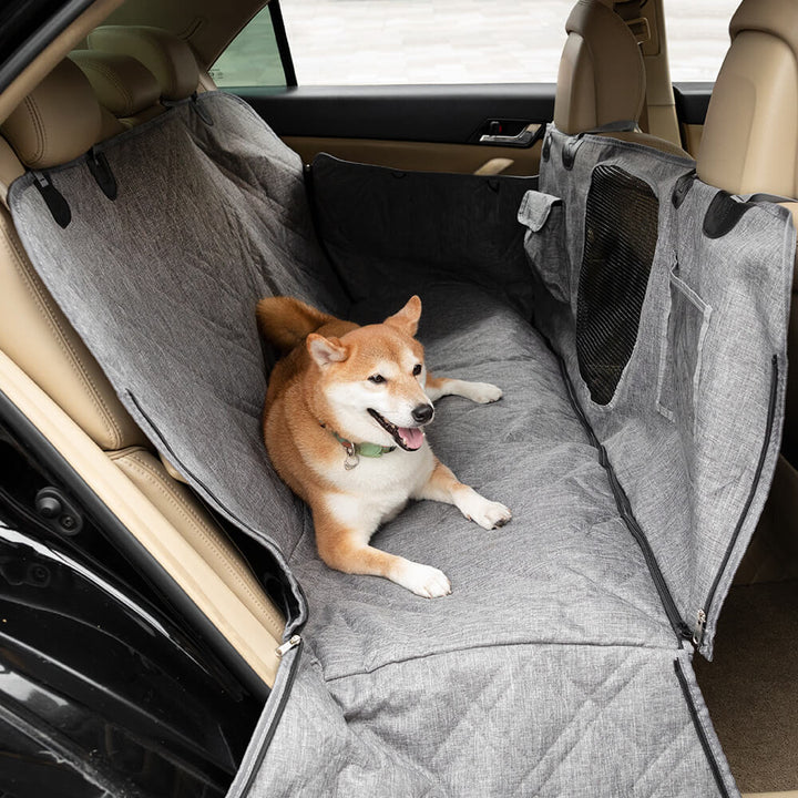 Hundeautositzbezug, wasserdicht & kratzfest, schützt den Rücksitz beim Transport Ihres Hundes.