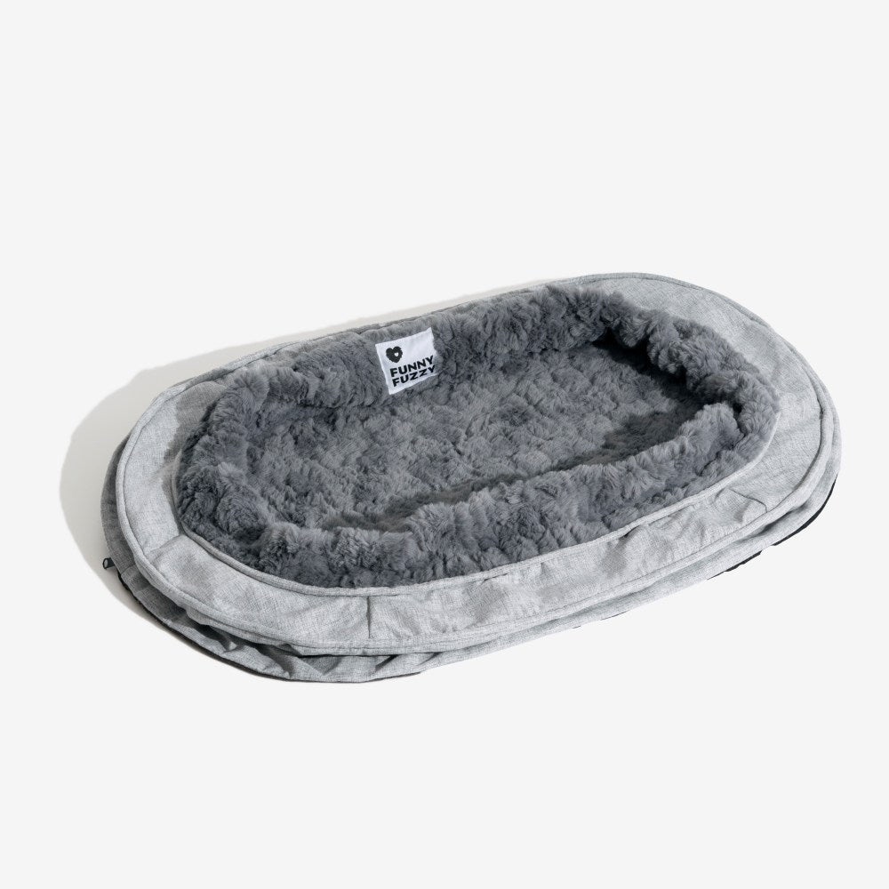 Hochwertiger Hundebettbezug in Donutform, waschbar, für langanhaltenden Komfort.